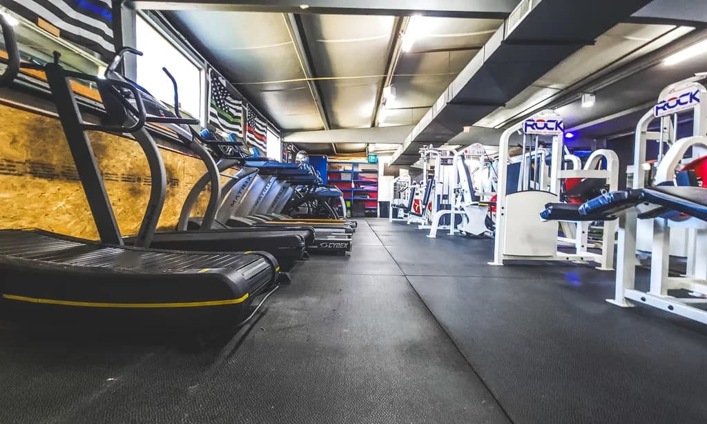 Cardio equipment inside The Rock gym